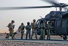 SOTG operators load up in a Task Force No Mercy (101 Combat Aviation Bde) UH-60 at MNB Tarin Kowt in October 2010. Pic DVIDs